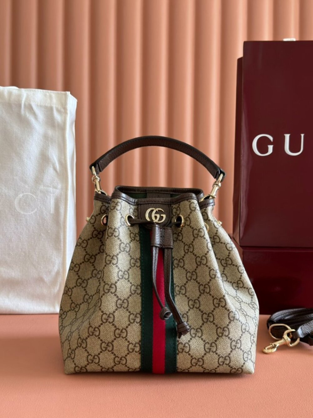Ophidia small bucket bag in beige and brown GG fabric
